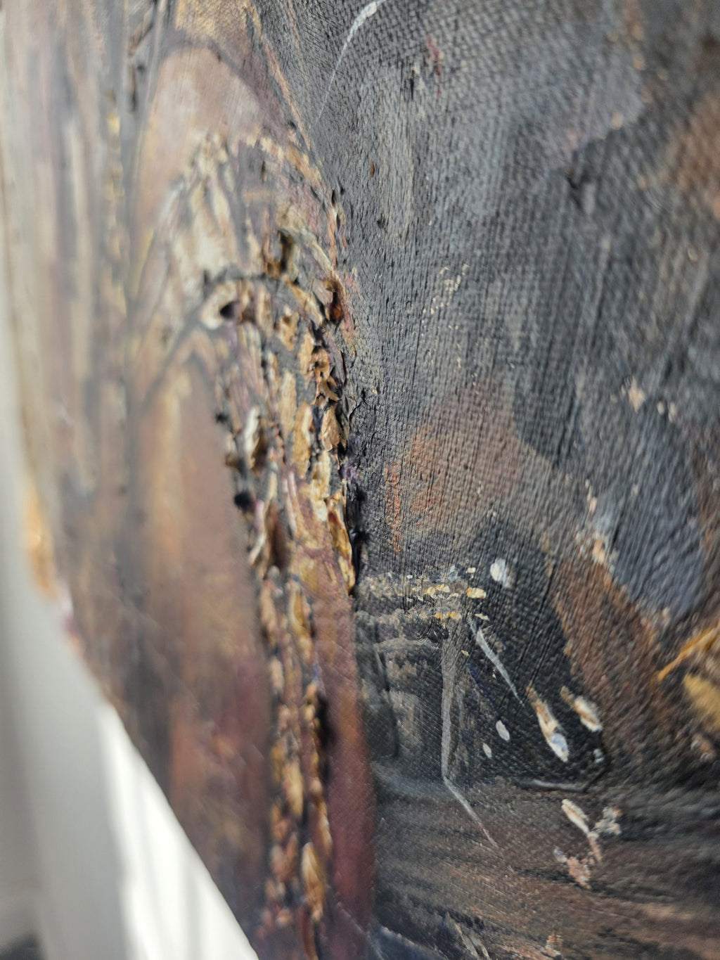 Side angle showing the textured beadwork standing out from the canvas on the Queen Tsandzile painting