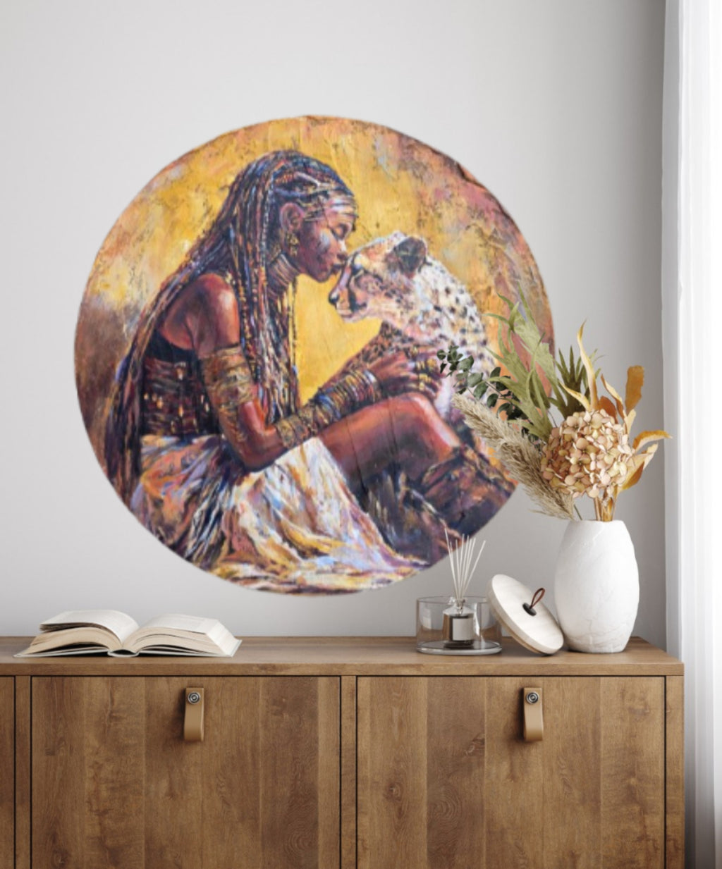 Jedidah Chick painting of Queen Ranvavalonna II of Merina aka Madagascar.    The painting is hanging over a wooden cabinet with ornaments, a vase of flowers and a book.