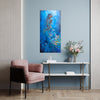 Modern interior with  a chair, and a small table with flowers and on the wall mermaid art underwater painting, of African Queen Mwana Tau of Kenya, textured art, African artwork.