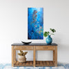 Decorative interior setting with a wooden console table, blue vase, and mermaid art underwater painting, African Queen Mwana Tau of Kenya, textured art, Africanartwork