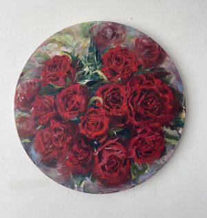 An impressionist circular acrylic painting of a bouquet of red roses. "It's ok to feel delicate sometimes. Real beauty is in the fragility of your petals. A rose that never wilts isn't a rose at all.” - Crystal Woods Ready to hang on a round canvas board 40 cm in diameter